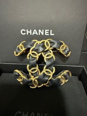 CHANEL Black and Gold Interwoven CC Chain Brooch